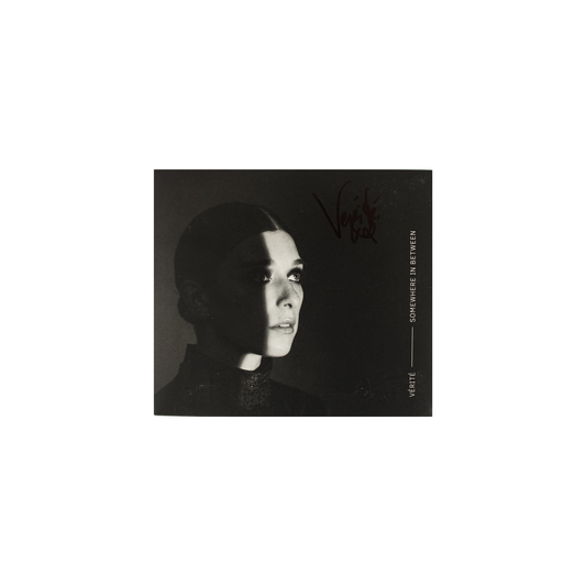 *signed* somewhere in between cd